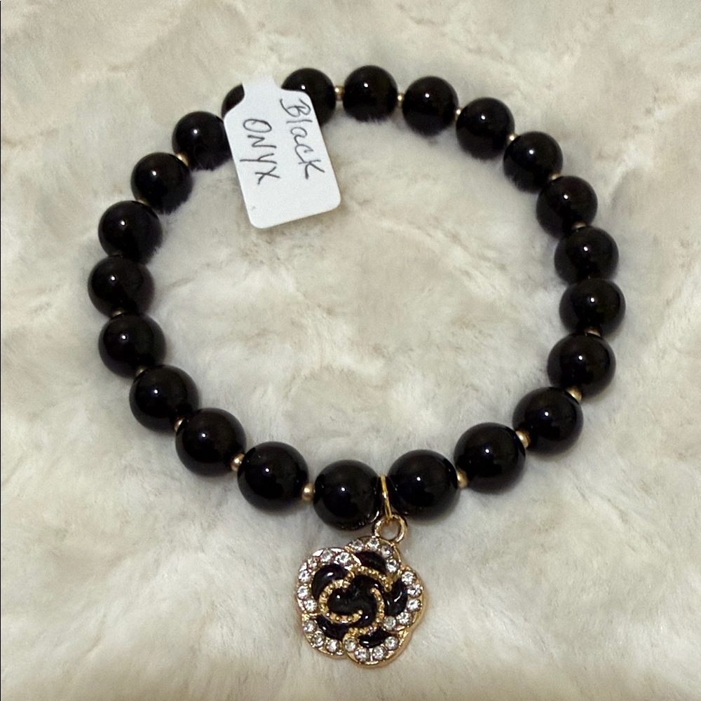 NWOT Elegant Black Onyx Bracelet with Gold Tone Charm